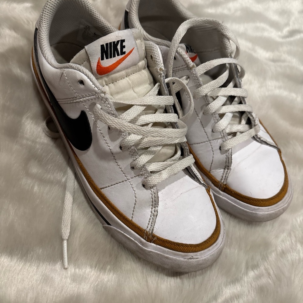 Nike White Sneakers with Black and Orange Details